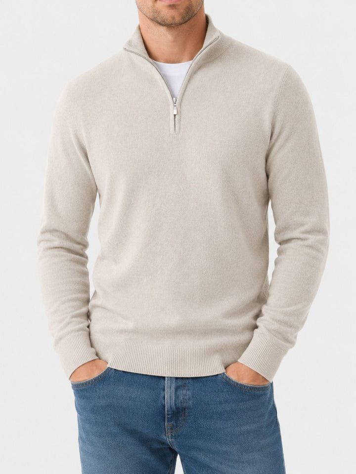 Textured fabric detail of mens casual wear v-neck jumper and zipper