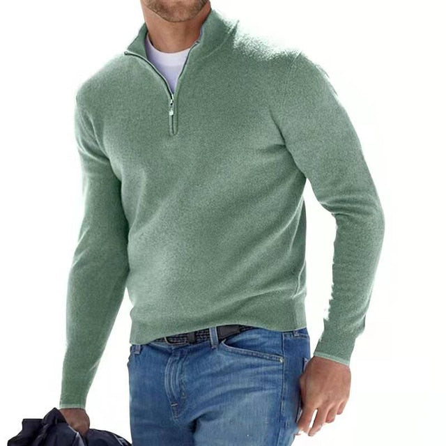 Man wearing green V-neck jumper with zip detail
