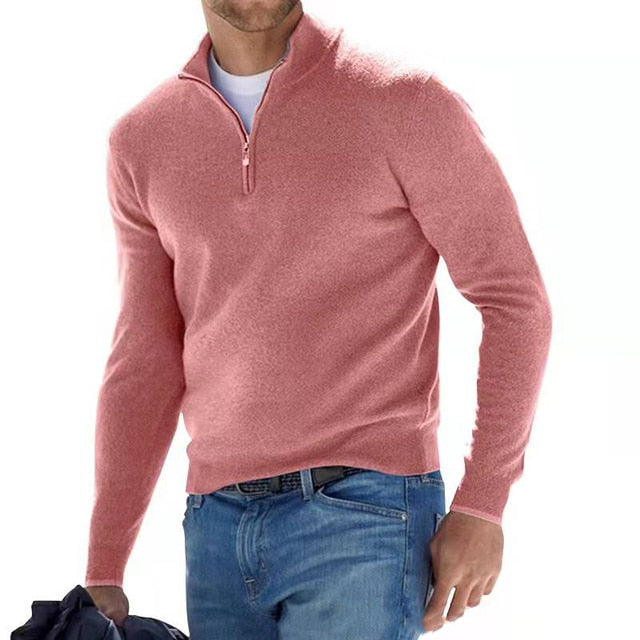Man wearing pink V-neck jumper with zip detail
