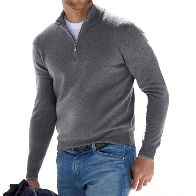 Detailed shot of ribbed cuffs on mens v-neck sweater with zip accent
