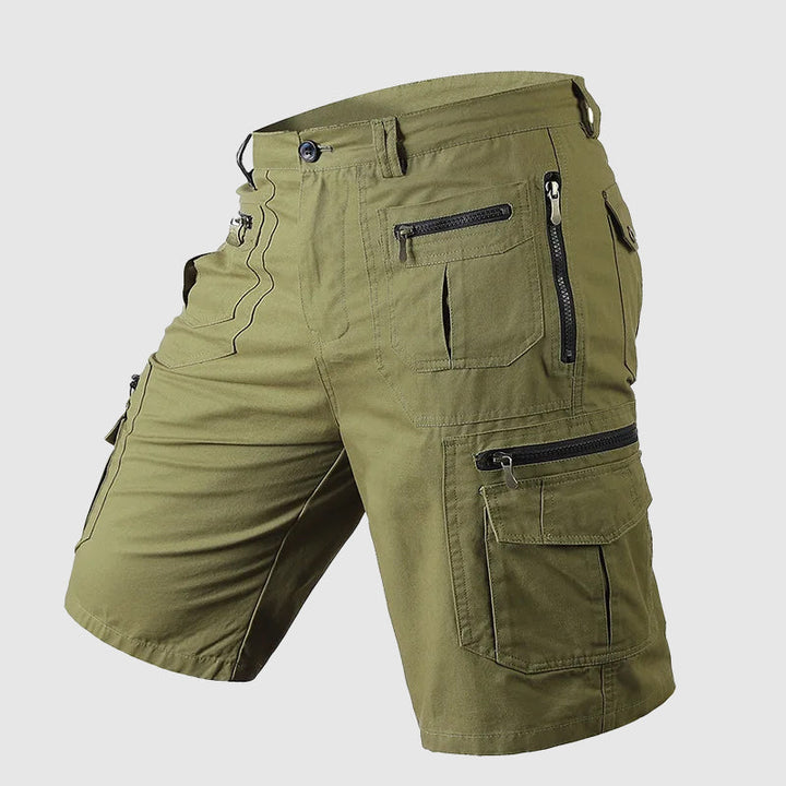 Men's green cargo knee length shorts featuring secure storage
