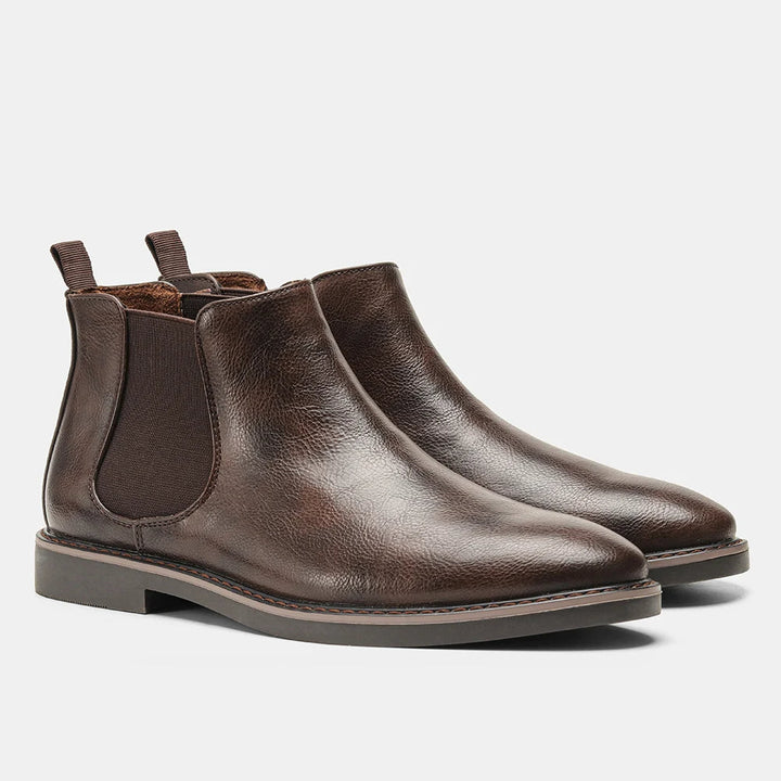 Mens fashion ankle boots featuring a minimalist design and durable rubber sole