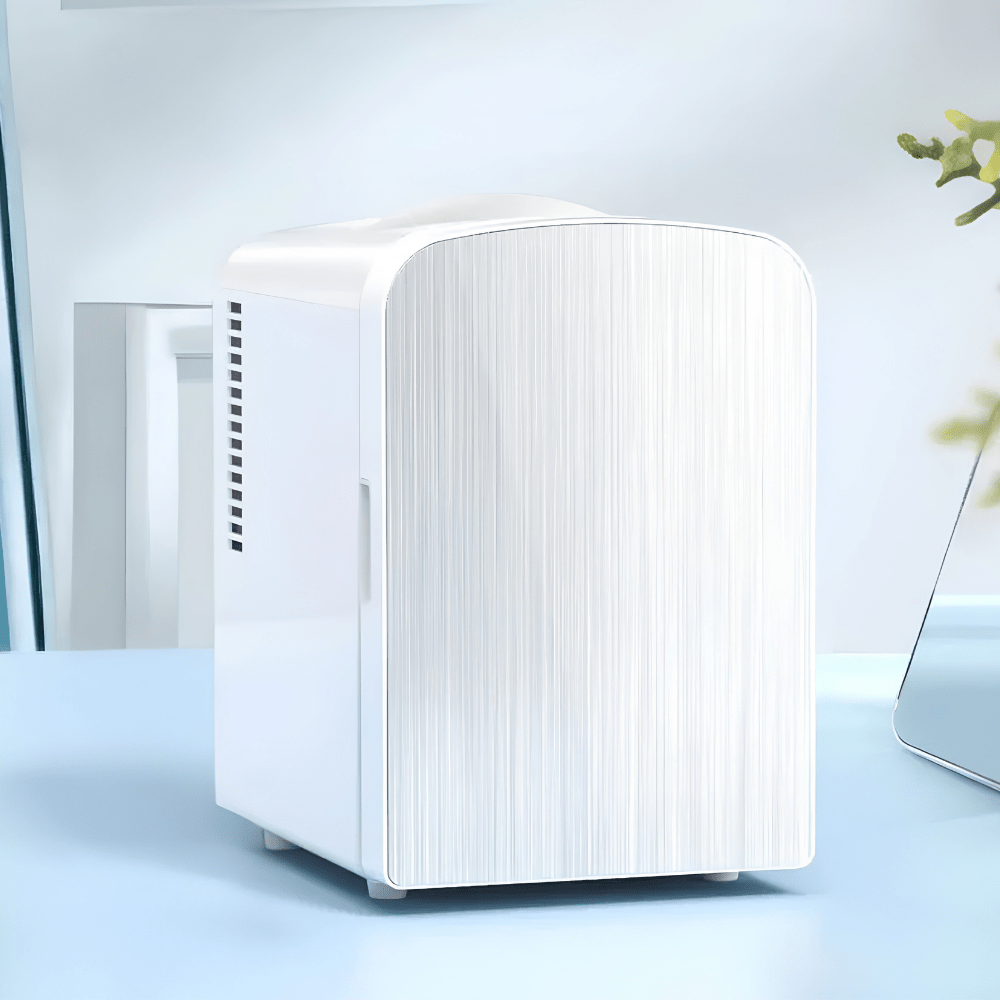 Portable white 4L mini fridge for skincare and snacks on a tabletop