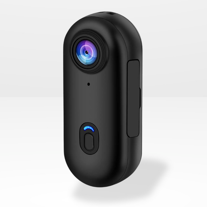 Close-up front view of the black 4K mini camera showing lens and power button