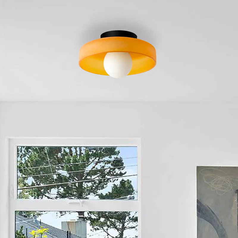 Detailed view of flush mount ceiling light hardware and mounting base