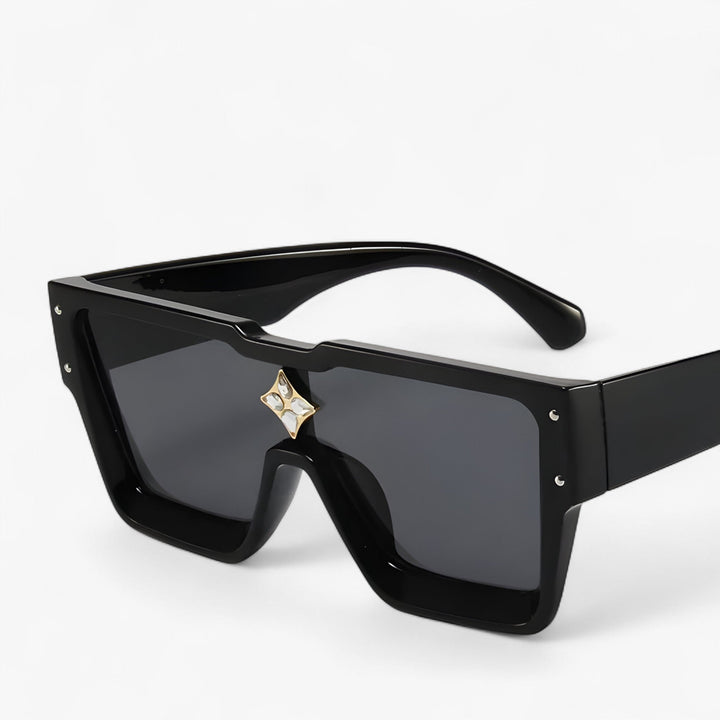 Black angular punk sunglasses with reflective lenses