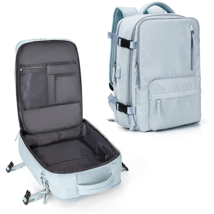 Spacious main compartment of the unisex laptop backpack packed for a trip