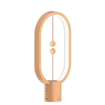 Modern balance table lamp in wood finish showing floating magnetic switch