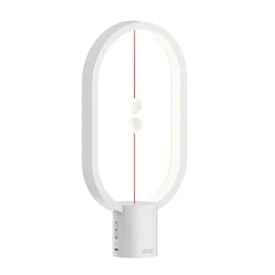 Close-up of the magnetic switch mechanism on a contemporary wooden LED desk lamp for home decor.