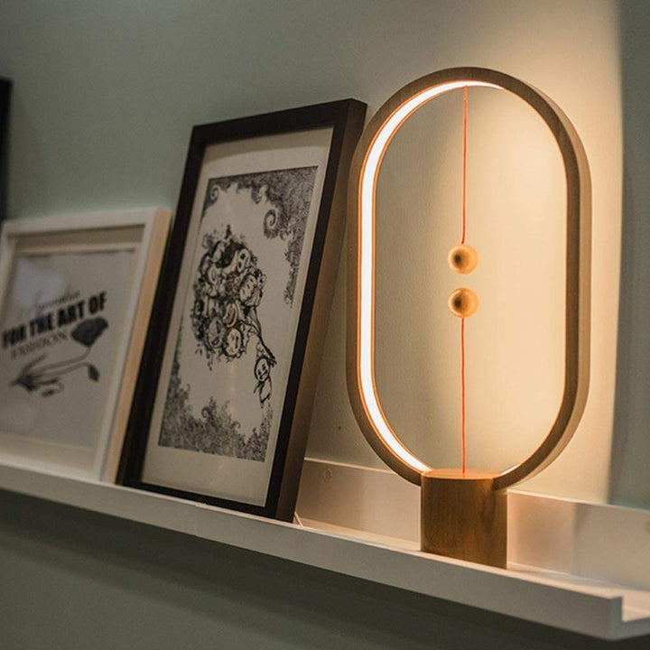 Sleek minimalist bedside lamp emitting warm ambient light, perfect for modern interior design.