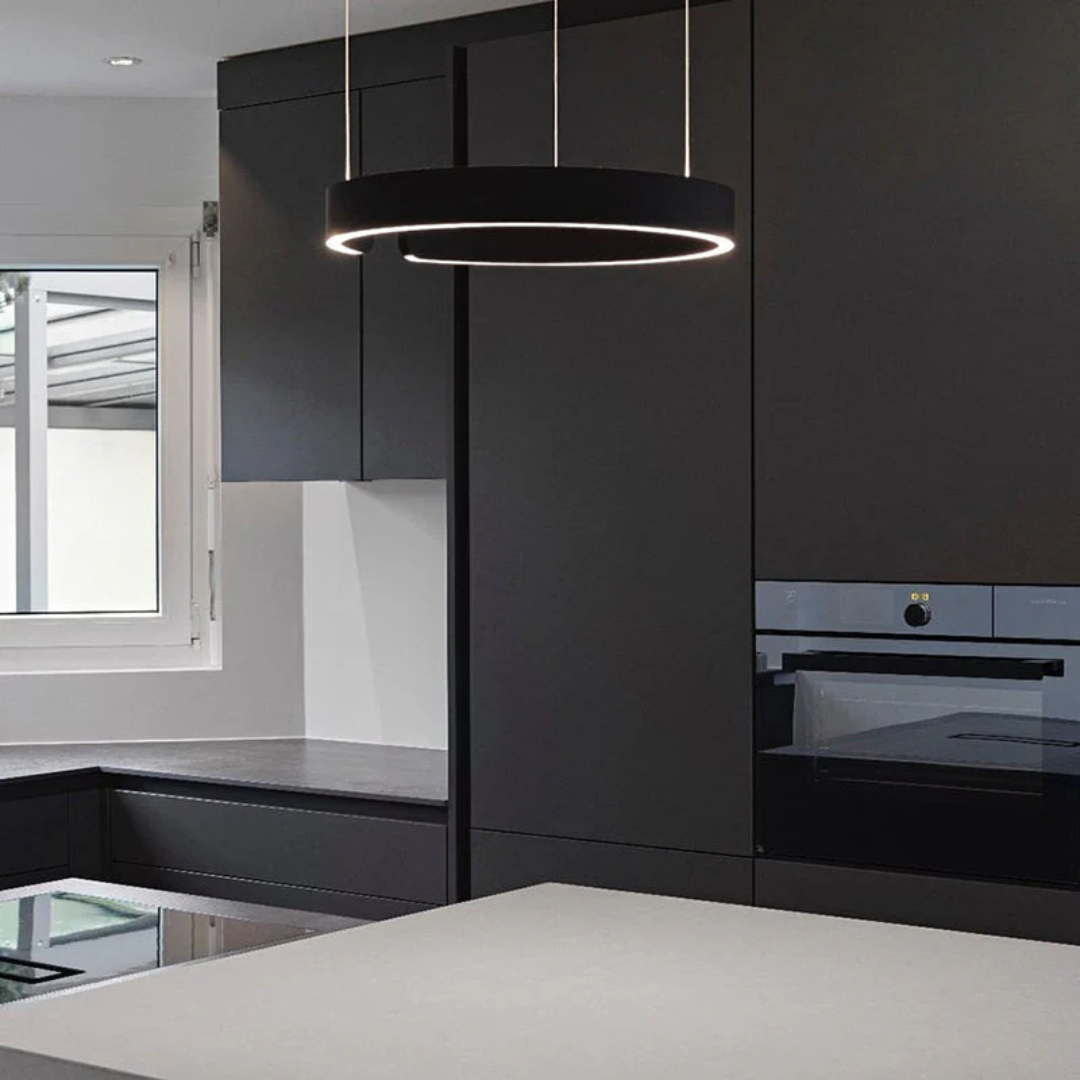Close-up of the modern ring pendant light showing the sleek metal finish and integrated LED strip.