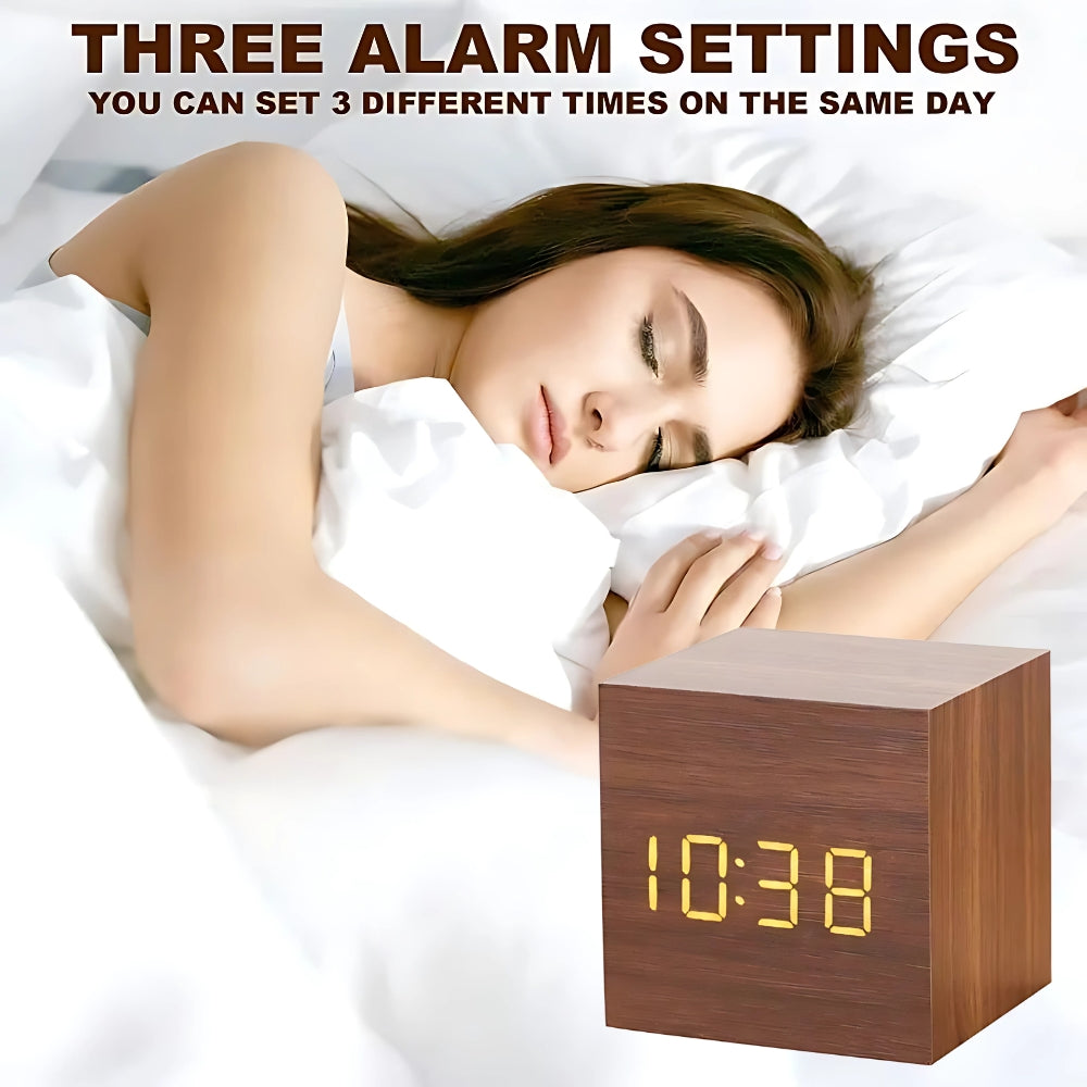 Close-up of minimalist digital led clock with glowing numbers for bedside