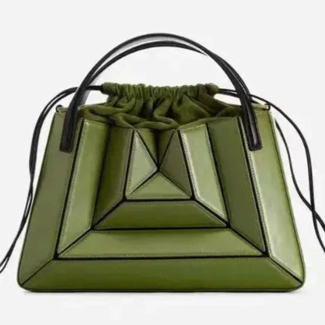 Green geometric handbag featuring structured panels and black top handles
