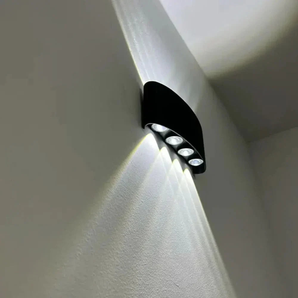Sleek architectural modern LED fixture installed beside a contemporary front door