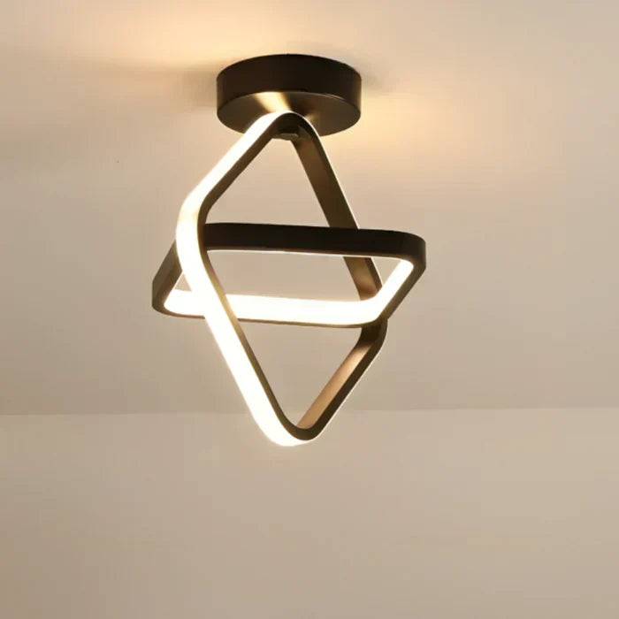 Sleek double ring ceiling light illuminated with warm white LED glow