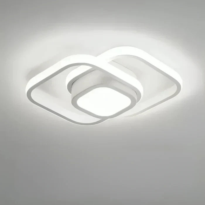 Ambient warm lighting emitted from the modern LED ceiling light fixture