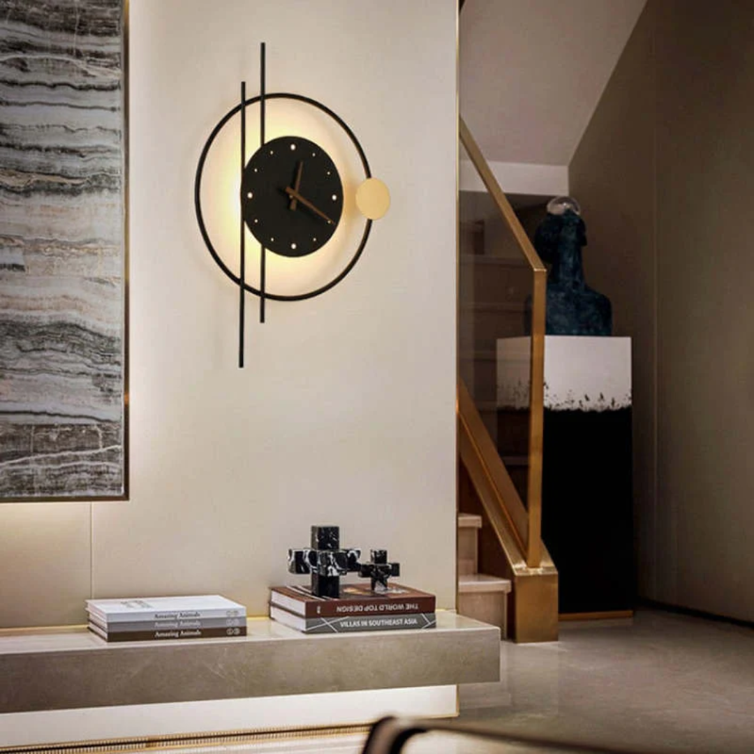 Modern LED wall clock lamp illuminating a dark bedroom wall warmly