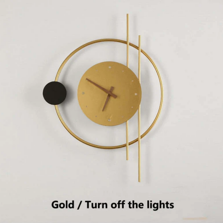 Close-up of the elegant gold frame on the modern LED wall clock lamp
