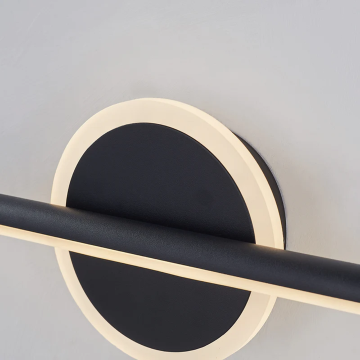 Modern LED wall lamp with diffusing shade mounted in a hallway