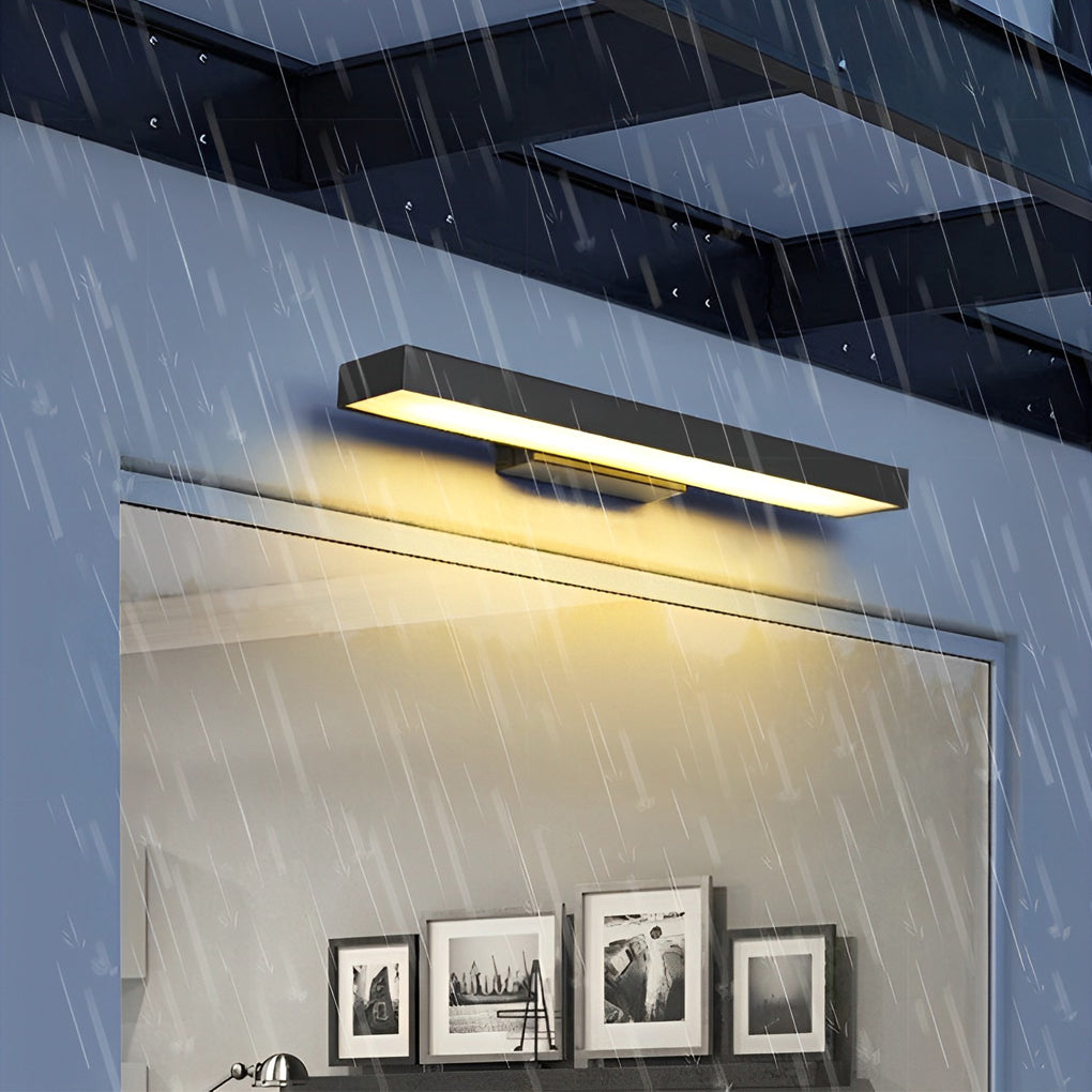 Water-resistant modern LED wall lamp installed outdoors during rainfall
