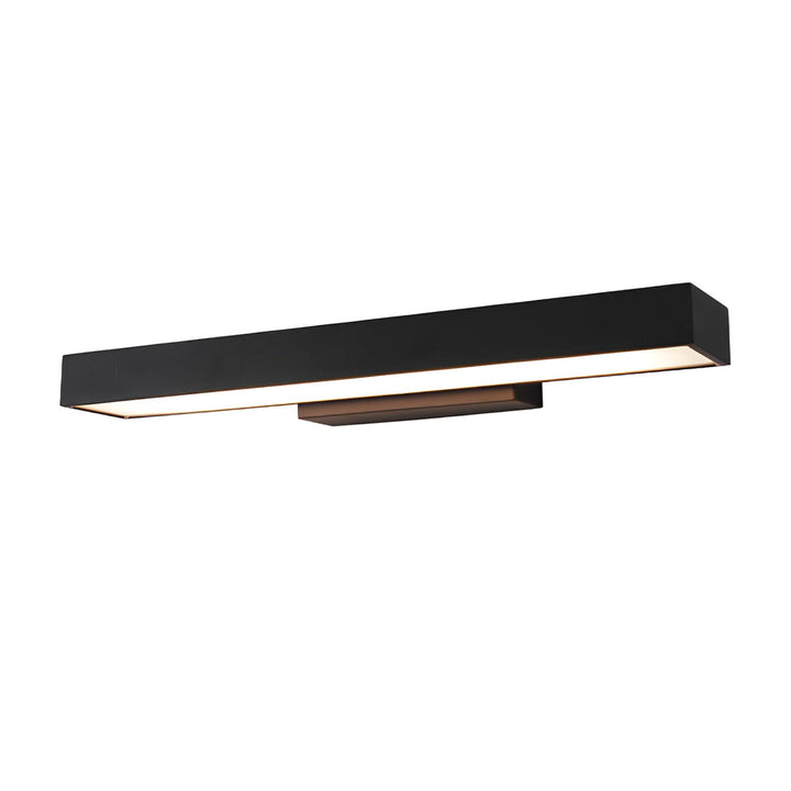 Weatherproof outdoor light casting warm illumination down a modern exterior wall