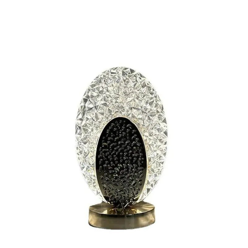 Unlit modern peacock table lamp displaying its unique textured design
