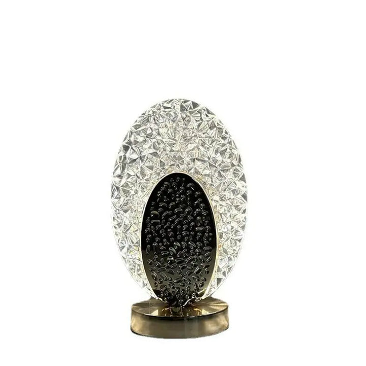 Unlit modern peacock table lamp displaying its unique textured design