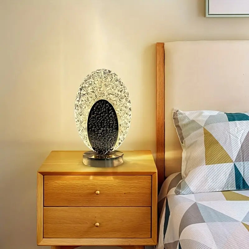 Modern peacock table lamp angled side view showing golden bird base and warm LED light