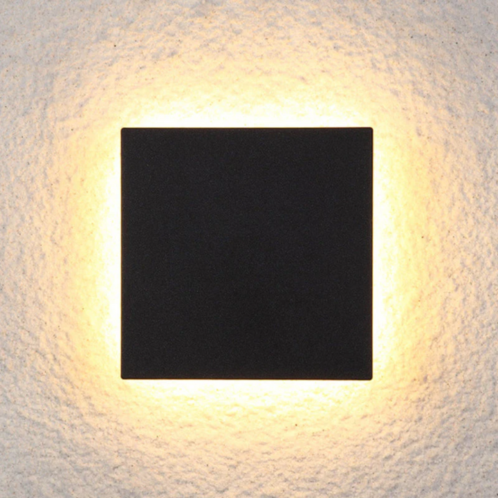Sleek profile of the modern minimalist outdoor wall light in daylight