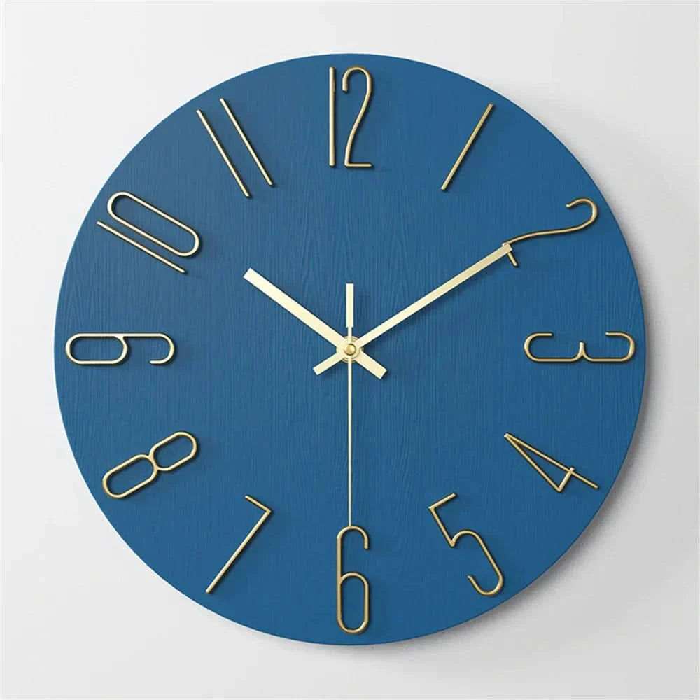 Vibrant blue wall clock with elegant gold 3D digits in a contemporary living space