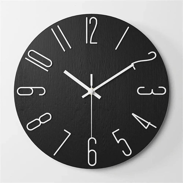 Silent movement modern minimalist clock mounted on a white wall