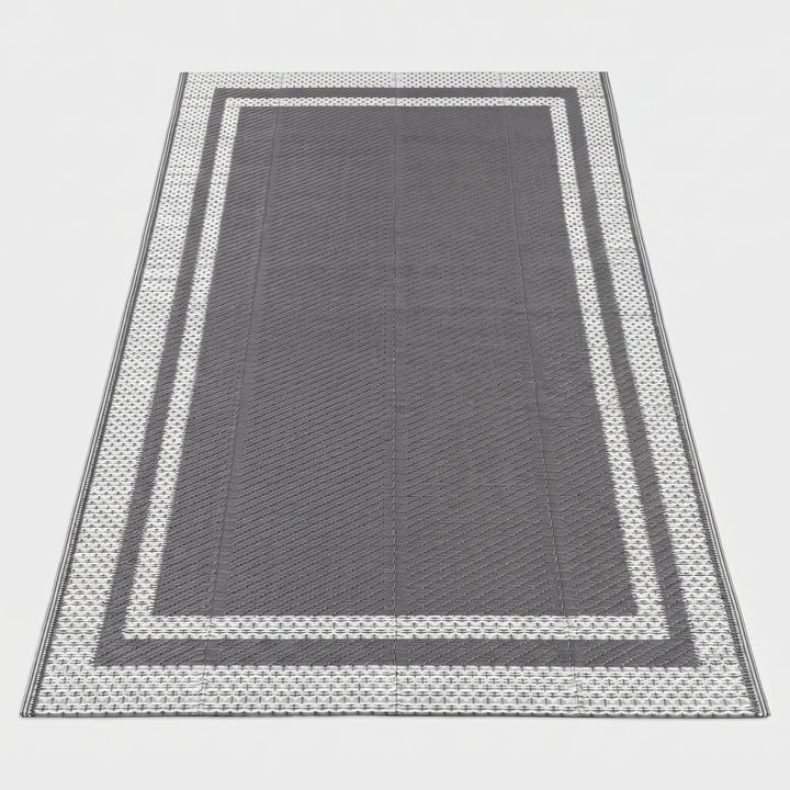 Gray outdoor rug with geometric pattern for patio flooring