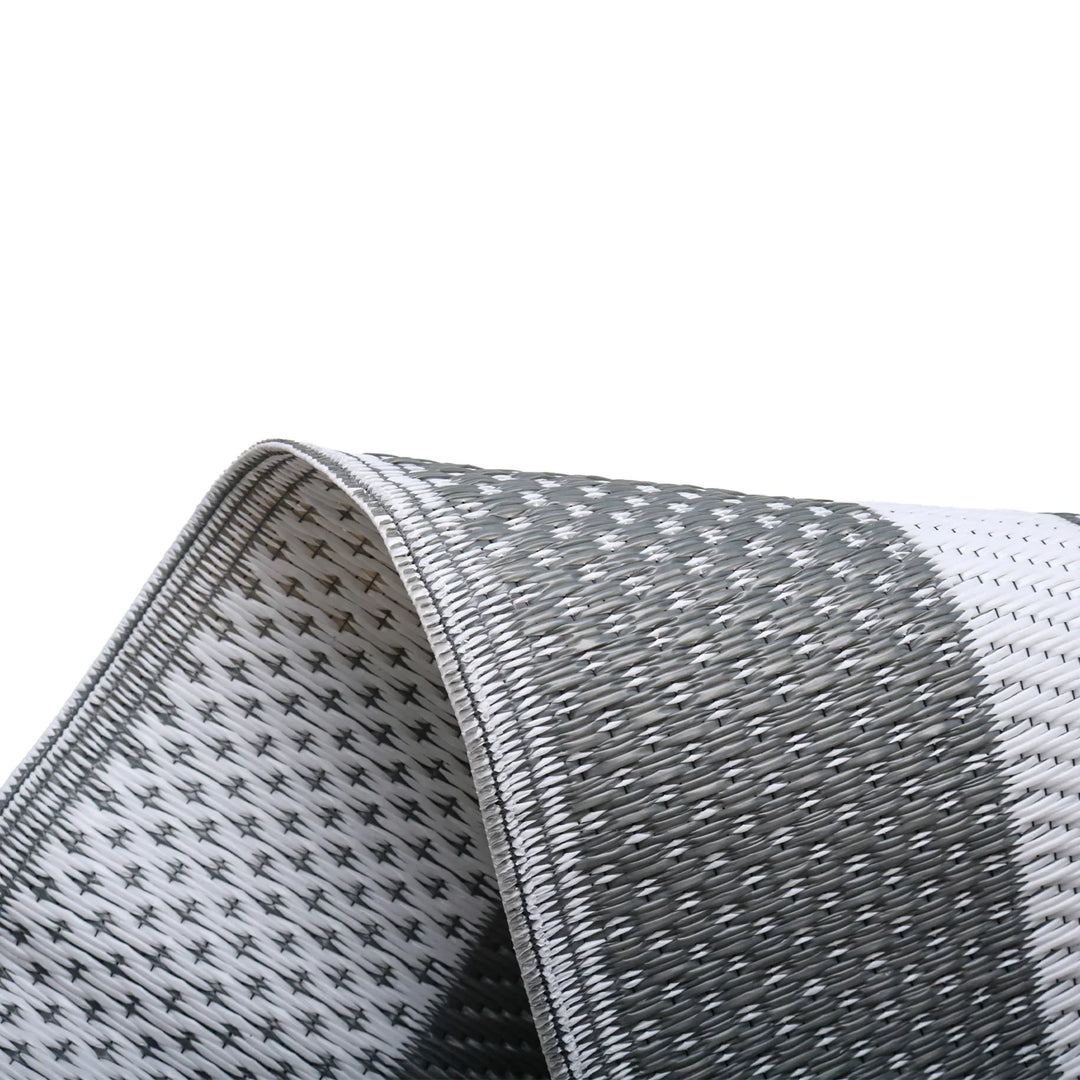 Durable gray decking mat rolled out for RV and outdoor use