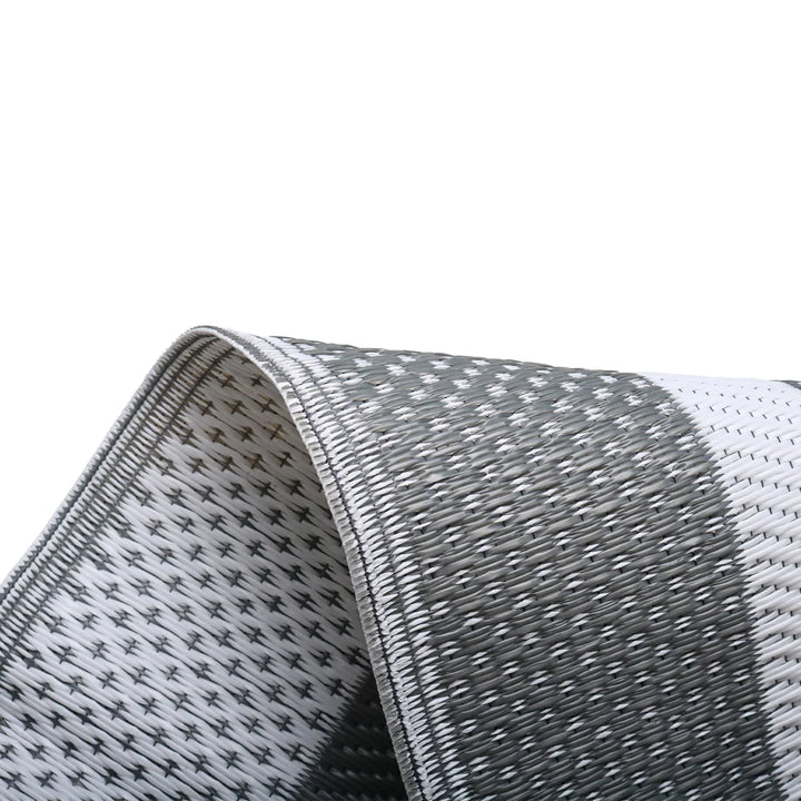 Durable gray decking mat rolled out for RV and outdoor use