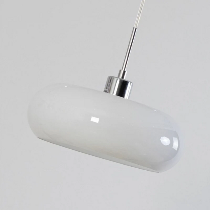 Close-up view of the sleek metallic finish on the modern hanging light
