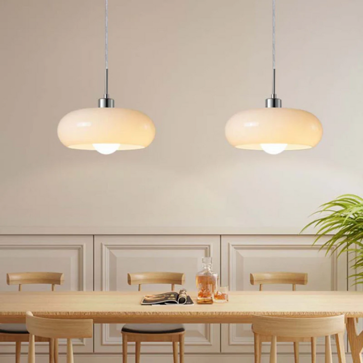 Minimalist circular ceiling lamp design viewed from a low angle