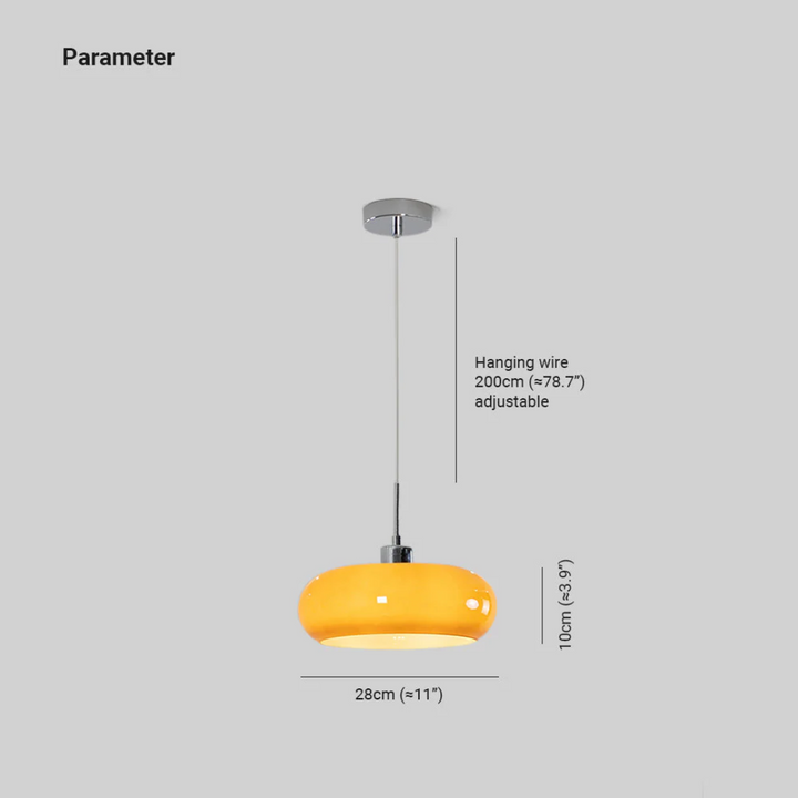 Modern pendant light casting soft illumination in a stylish bedroom