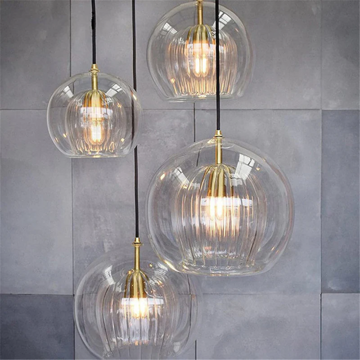 Close-up of the modern glass pendant light showing textured spherical design