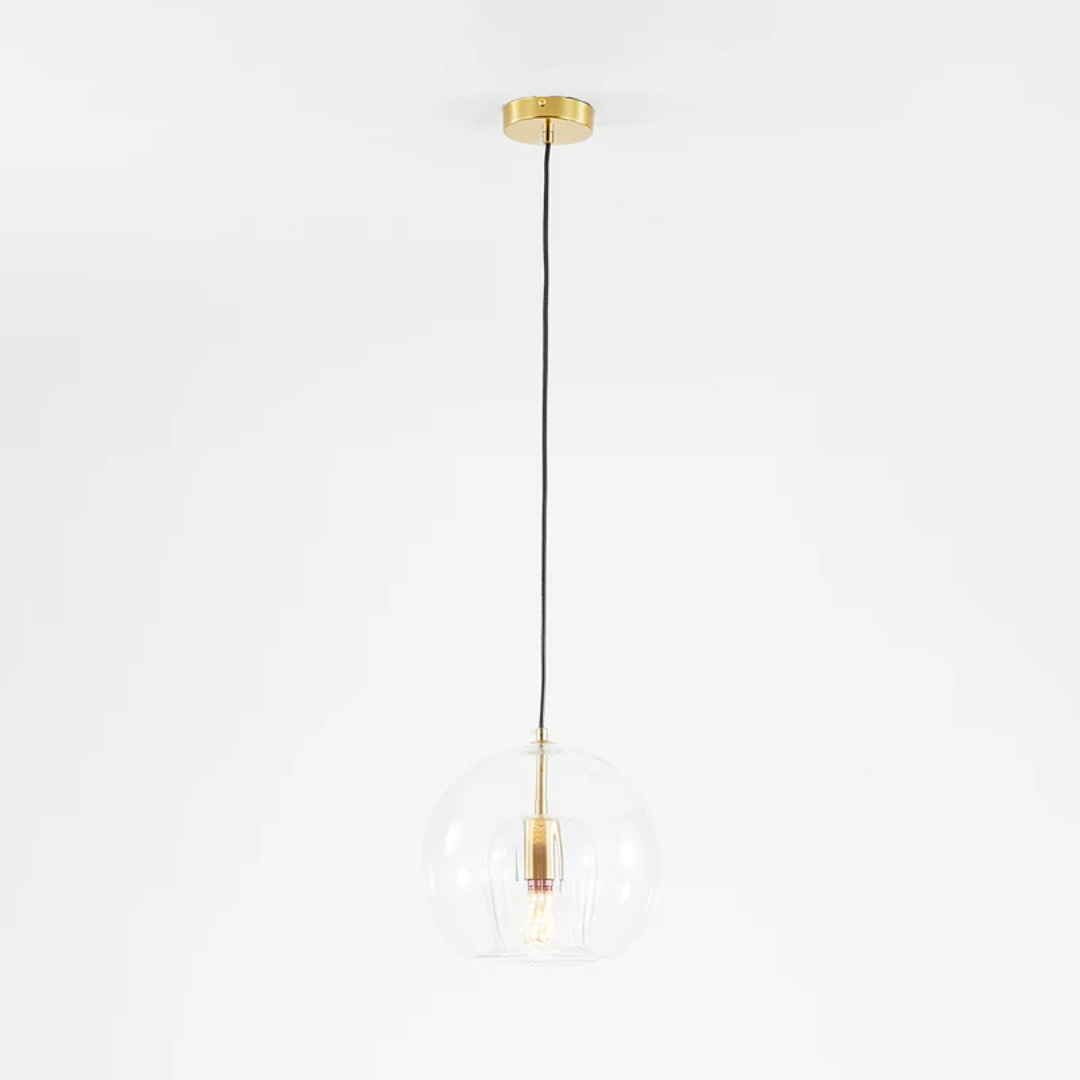 Stylish LED ceiling light hanging over a minimalist dining room table