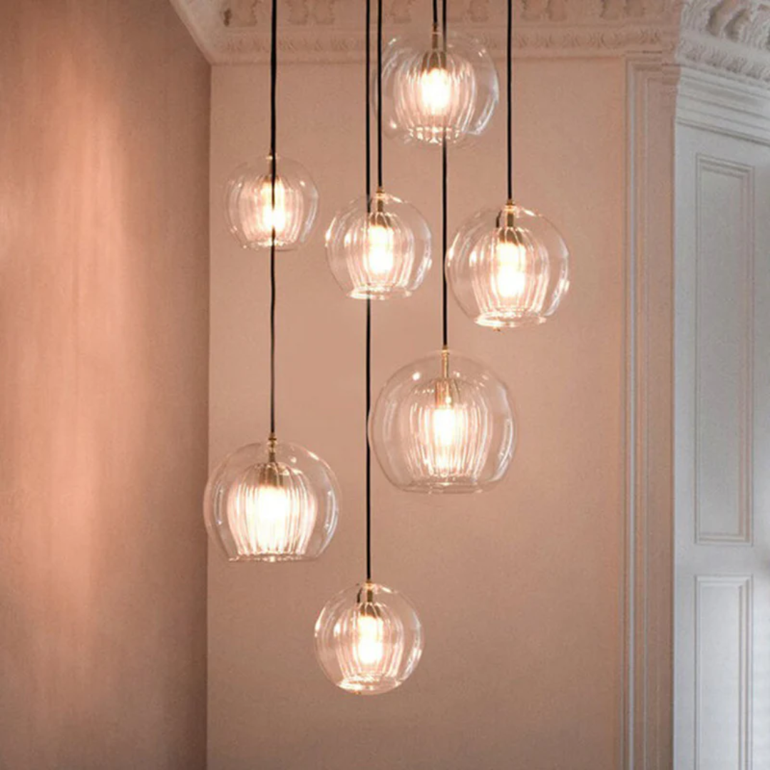 Elegant glass pendant fixture showcasing warm LED interior lighting