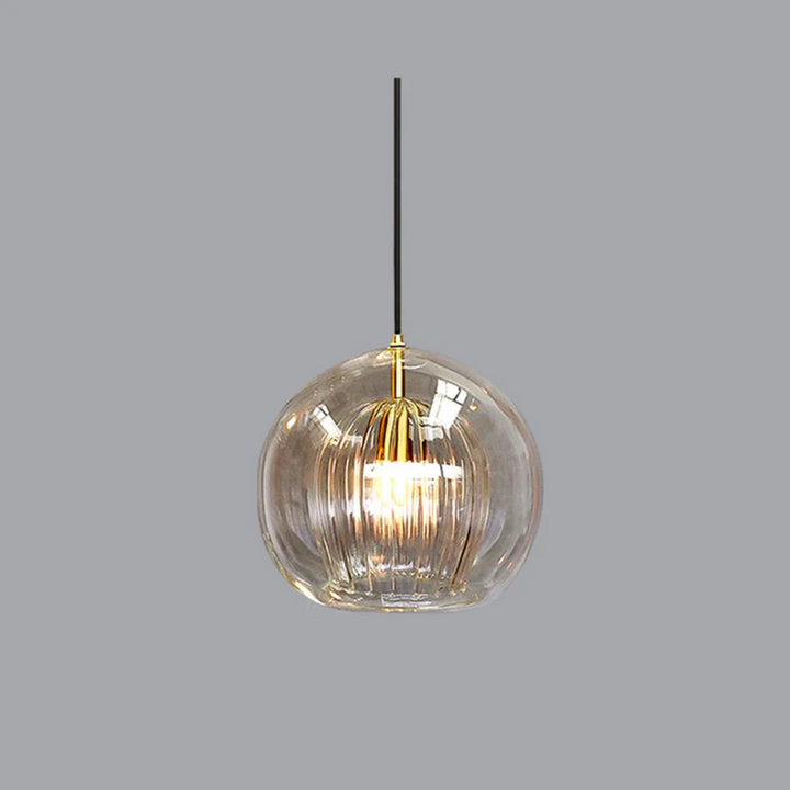 Modern spherical LED pendant light mounted on a white ceiling