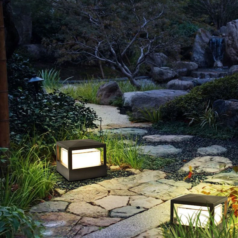 Sleek LED garden light mounted on a low brick wall for exterior illumination
