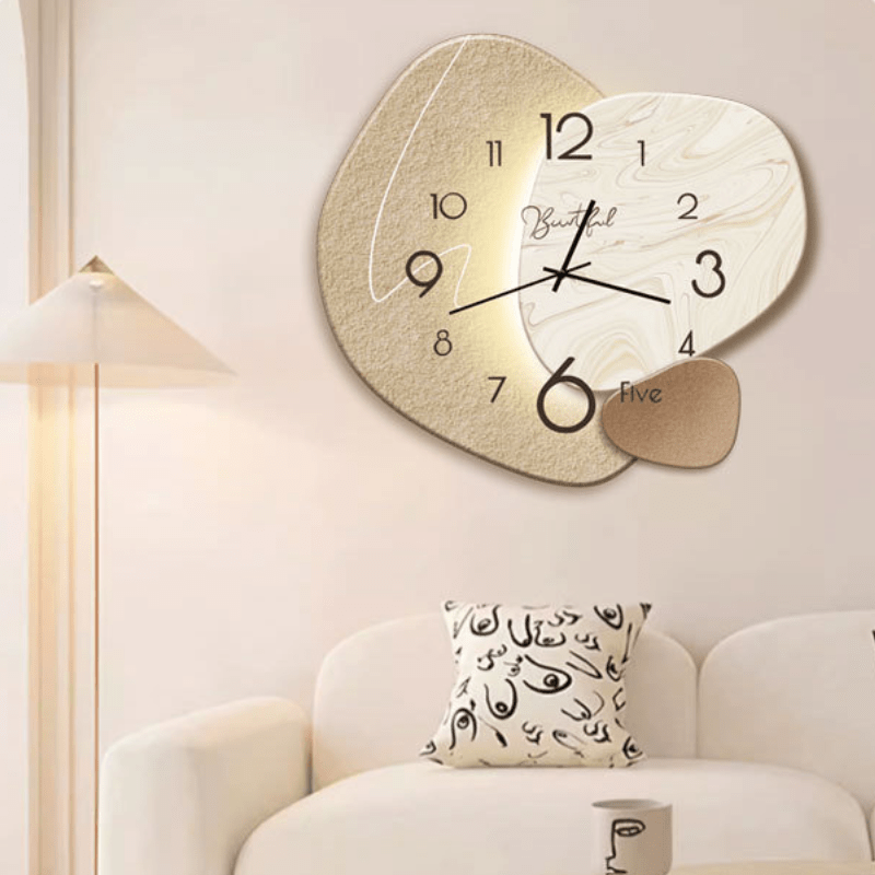 Minimalist Scandinavian wall clock mounted in a modern living room above a sofa