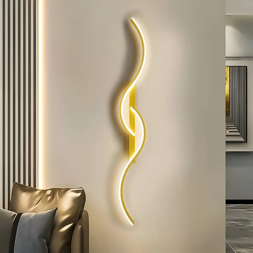 Gold modern curved LED wall light mounted in a luxury living room