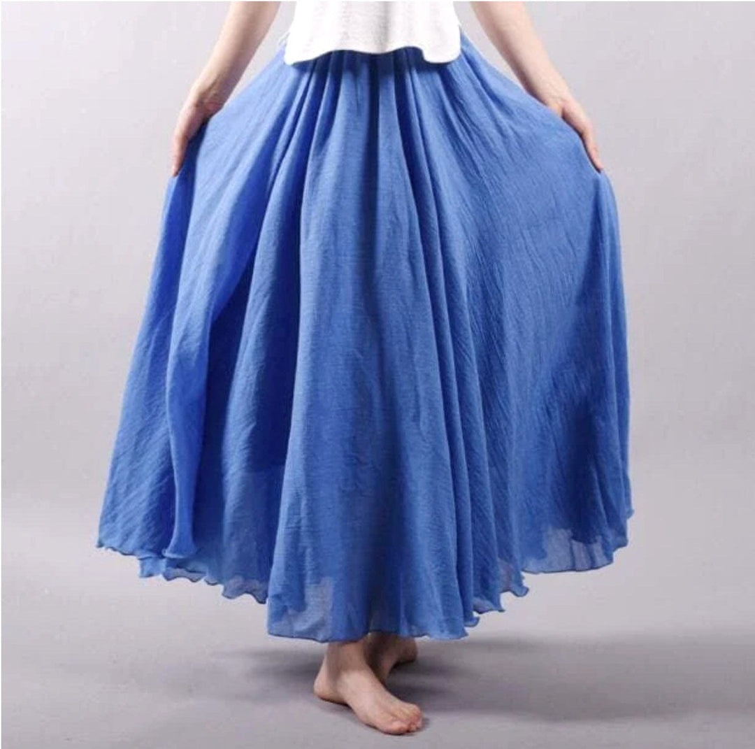 Morgan women's flowy summer skirt in blue worn outdoors