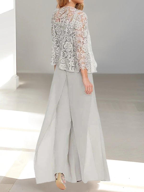 Back view of women showing the back detailing of the formal pantsuit and jacket