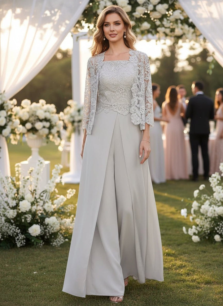 Full length view of women posing outdoors in a wedding setting wearing a formal pantsuit
