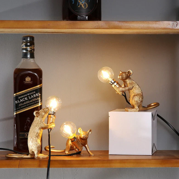 Whimsical mouse table lamp glowing in a cozy living room setting