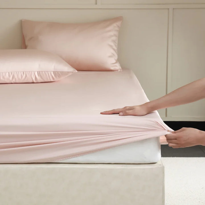 Emerald green mulberry silk flat sheet showing luxurious smooth texture and sheen
