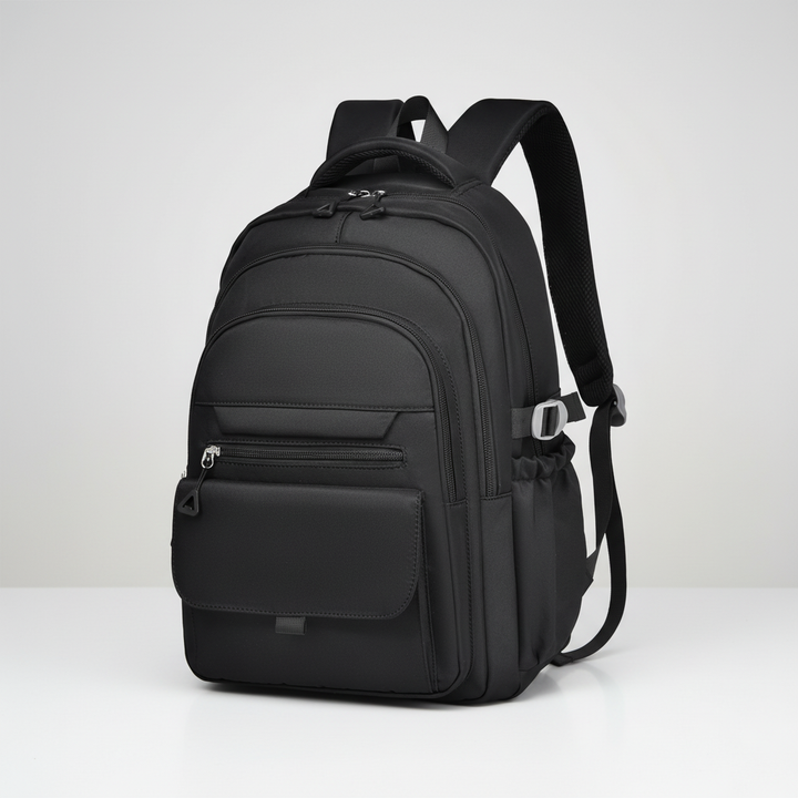 Black multi layer laptop backpack displayed against a neutral studio background